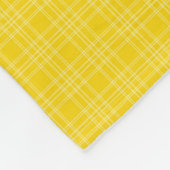 The front features a bright yellow checkered  fleecedecke (Ecke)
