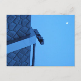 The moon hangs above the breakwater.  postkarte