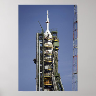 The Soyuz rocket is erected into position 3 Poster