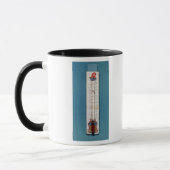 Thermometer übergestiegen mit einer phrygian Mütze Tasse (Links)