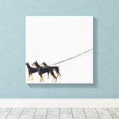 Three Dobermans on leash Leinwanddruck (Insitu (Holzboden))