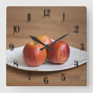 Three ripe apples quadratische wanduhr