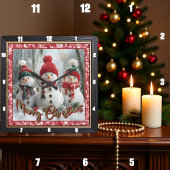 Three Snowmen Merry Christmas Quadratische Wanduhr