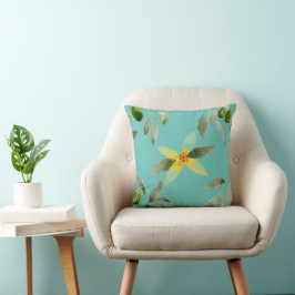 Throw pillow with olive design on light teal kissen