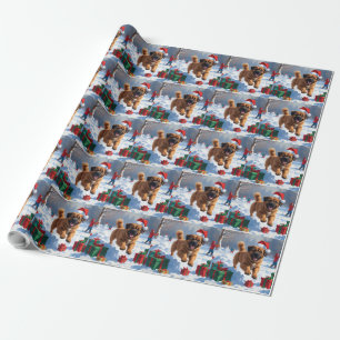Tibet-Mastiff läuft im Schnee mit Weihnachtsmütze Geschenkpapier