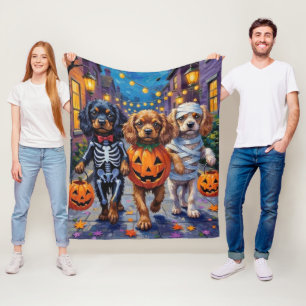 Tibet-Spaniel-Hunde in Halloween-Kostümen Fleecedecke
