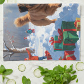 Tibetan Mastiff läuft mit Weihnachtsmut im Schnee Geschirrtuch (Gefaltet)