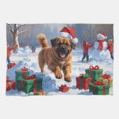 Tibetan Mastiff läuft mit Weihnachtsmut im Schnee Geschirrtuch (Horizontal)