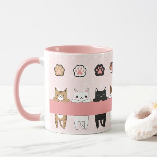 Tiernos gatitos en fondo rosa con flores tasse (Mit Donut)