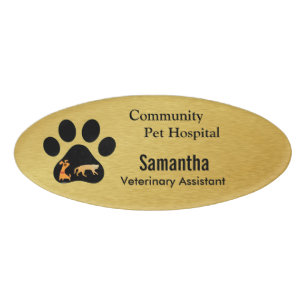 Tiertatze auf Goldplatten-Namensschild Namenschild