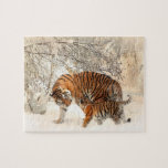 Tiger mit Schnee Puzzle<br><div class="desc">Tiger cub spielt mit seiner Mutter im Schnee.</div>