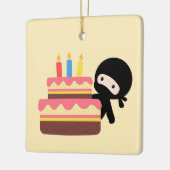 Tiny Ninja Behind Birthday Cake on Yellow Keramikornament (Links)