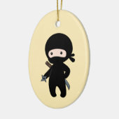 Tiny Ninja Holding Drewing Star auf Gelb Keramik Ornament (Links)