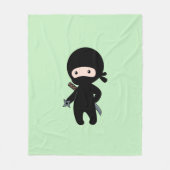 Tiny Ninja Holding wirbelt auf Grün Fleecedecke (Vorderseite)