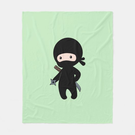 Tiny Ninja Holding wirbelt auf Grün Fleecedecke (Vorderseite)