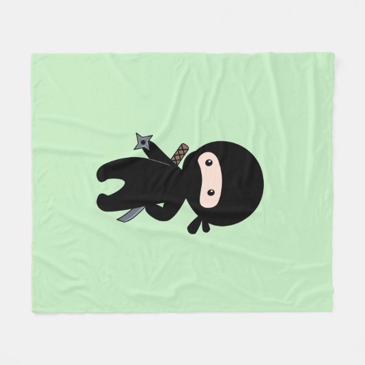 Tiny Ninja Holding wirbelt auf Grün Fleecedecke (Vorderseite (Horizontal))