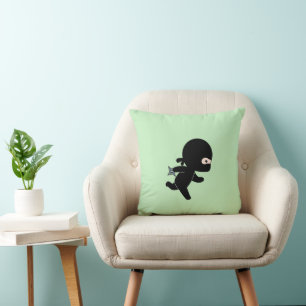 Tiny Ninja läuft auf Grün Kissen