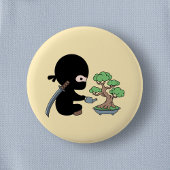 Tiny Ninja Watering Bonsai Tree on Yellow Button