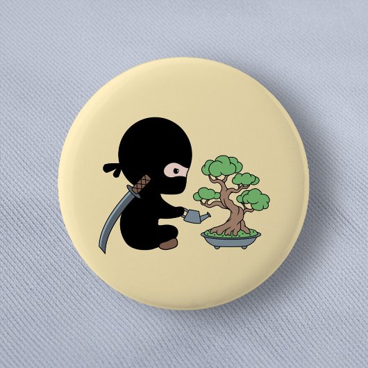 Tiny Ninja Watering Bonsai Tree on Yellow Button