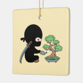 Tiny Ninja Watering Bonsai Tree on Yellow Keramikornament (Links)