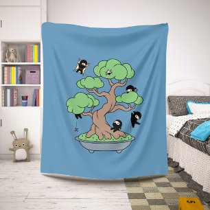 Tiny Ninjas in Bonsai Tree on Blue Sherpadecke