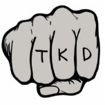 TKD Faustverzierung Fotoskulptur Ornament<br><div class="desc">Das TKD Faustschmuck ist eine einzigartige taekwondo Geschenkidee für einen Geburtstag,  Weihnachten,  Feiertag oder Gürteltrangliste Werbeaktion Test oder Prüfung. Dieses Kampfkunstschmuck hat ein erstes Design in einem mittleren Punch (mit freundlicher Genehmigung von designious.com) mit den Buchstaben,  die auf den Knöcheln getickt werden.</div>