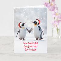 Tochter und Schwiegersohn Süße Pinguine im Schnee