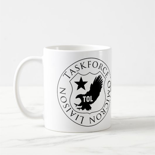 TOL Schild (2), schwarz auf weißer Tasse (Links)