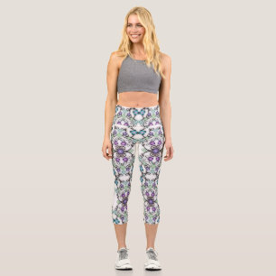 Tolles Spitzenmuster aus blau-violetten Blumen  Capri Leggings
