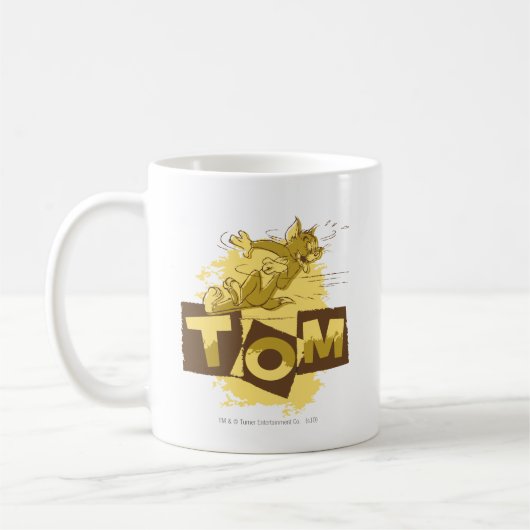 Tom schiebt Stopp Kaffeetasse (Links)
