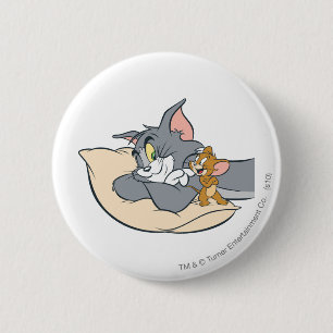 Tom und Jerry auf Kissen Button