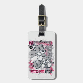 Tom und Jerry sehen sich den Rücken an Gepäckanhänger