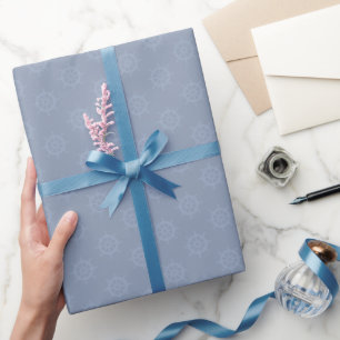 Tonales Steuerrad auf hellgrauem Blau Geschenkpapier