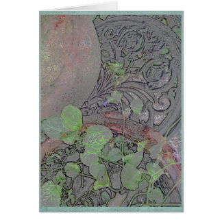 Tongefäß und Schmiedeeisen in einem Garten