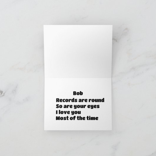 Top-View-Rekord umgeben von Musiknoten Karte (Innenseite)