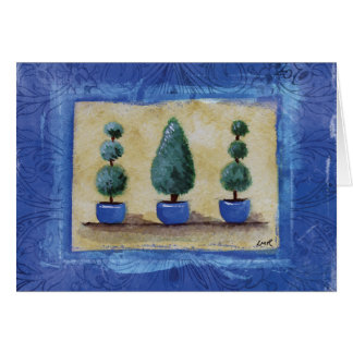 Topiary-Bäume mit blauer Grenze