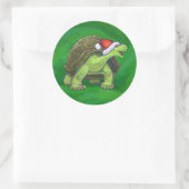 Tortoise in der Weihnachtsmannmütze auf grün Runder Aufkleber (Tasche)