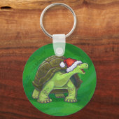 Tortoise in der Weihnachtsmannmütze auf grün Schlüsselanhänger (Vorderseite)