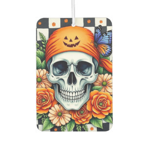 Totenkopf mit orangefarbener Bandana und Rosen mit Autolufterfrischer