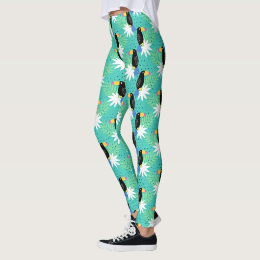 Toucans auf Aquamarinen Leggings (Links)