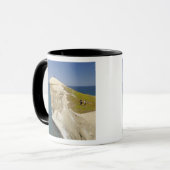 Touristen auf die Klippenoberseite am Tasse (Vorderseite Links)