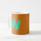Toxisches Orangengrün, Creepy Monogram Kaffeetasse (Vorderseite Links)