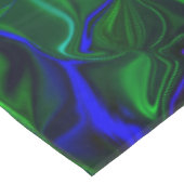 Traços azuis 'flutuando' sobre fundo verde tischdecke (Schrägansicht)