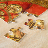 Traditionelle afrikanische Kunst des Goldenen Rote Puzzle (Seite)