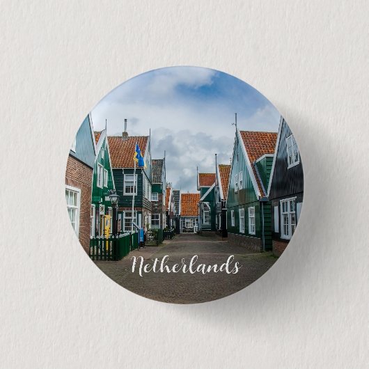 Traditionelle Holzhäuser in Marken Button (Vorderseite)