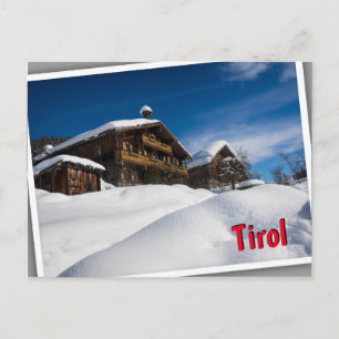 Traditionelle Holzhütten im Schnee in Tirol Postkarte