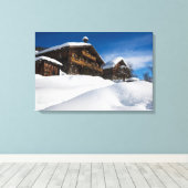 Traditionelle Holzhütten im Schnee Leinwanddruck (Insitu (Holzboden))