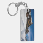 Traditionelle Holzhütten im Schnee Schlüsselanhänger (Vorderseite links)