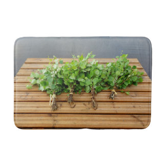 Traditionelles finnisches Bad auf einer Mole Badematte