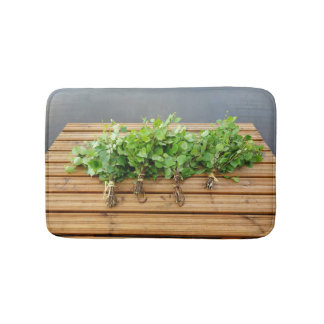 Traditionelles finnisches Bad auf einer Mole Badematte